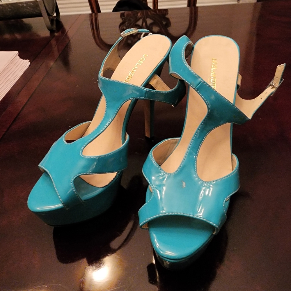 Teal heels size 8.5 (39)